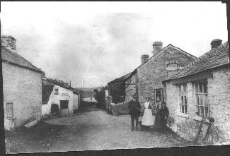 Jack Earle with his hoop along with Miss Dennis, Les Rundle and Olive Budge at Trebullett in 1919.