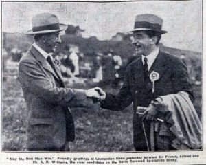 Sir Francis Acland (Liberal) shakes the hand of Mr. A. M. Williams (Conservative) as they meet at the 1932 show just before the by-election. 