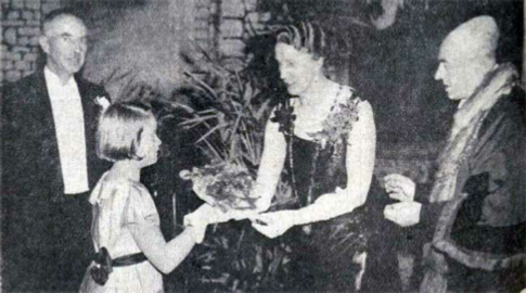 launceston-mayor-and-mayoress-mr-and-mrs-s-j-fitze-being-presented-with-a-bouquet-of-flowers-at-the-hospital-ball-in-november-1938