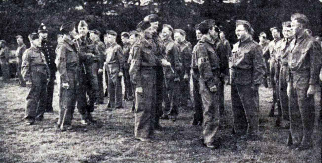 Lifton Homeguard on parade on the 5th of August 1940 at Lifton recreation ground being inspected by Lieut. Colonel R. L. Norrington.