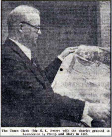 Stuart Peter (Town-Clerk) in 1949 with the Towns Royal Charter granted in 1555.