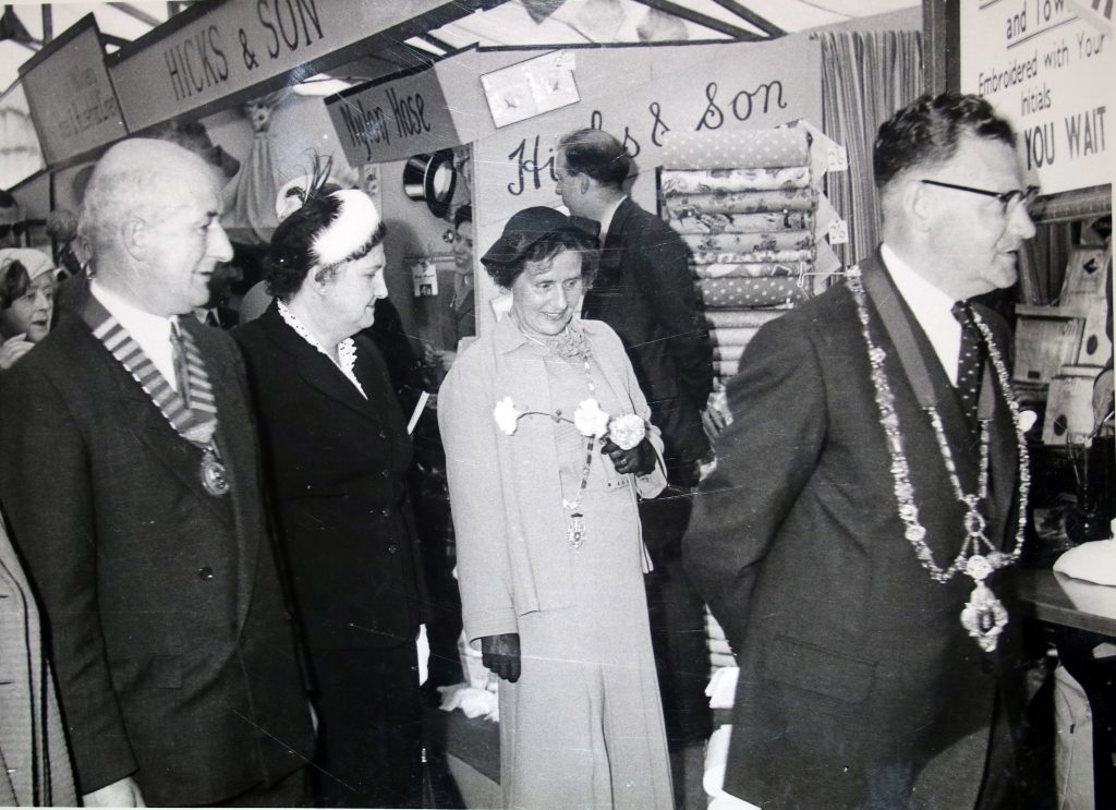 Cecil Robins and delegates tour the Launceston trades tent at the 1955 Bath and West Show