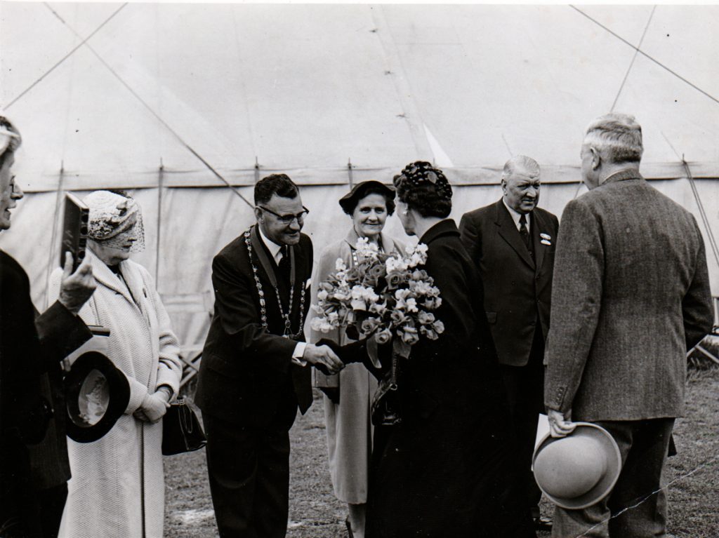 Cecil Robins greets the Duchess of Kent, Princess Marina
