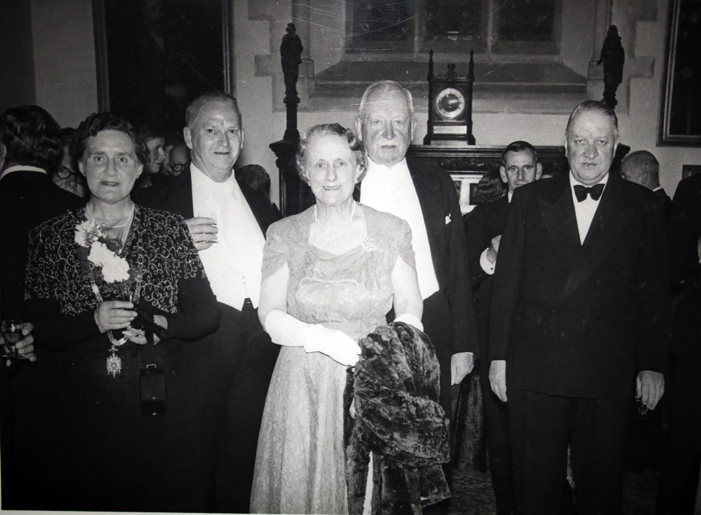 Gwendoline Robins with Mr. and Mrs. Stuart Peter and delegates at the civic ball for the 1955 Bath and West Show