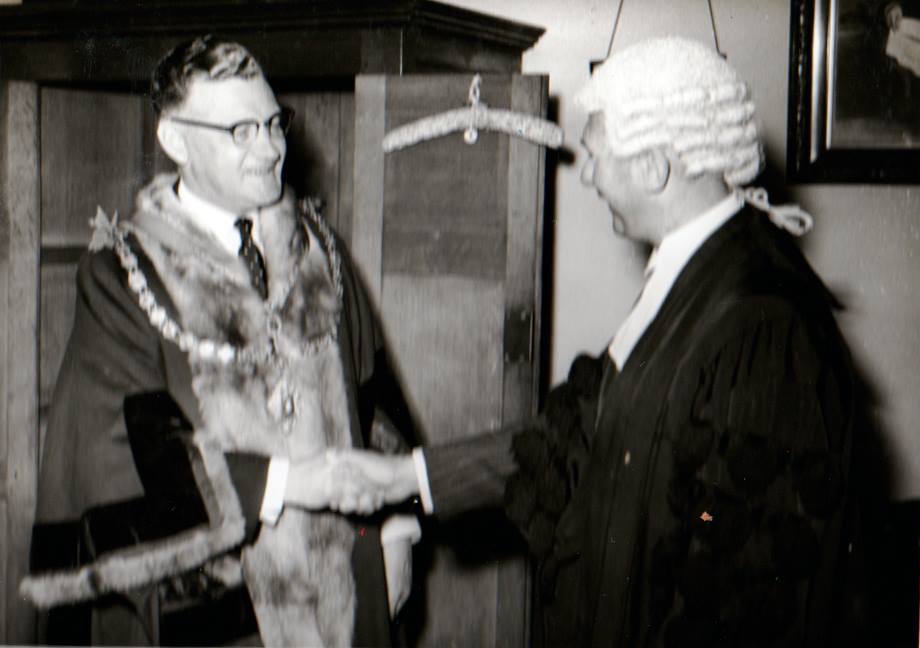 Newly chosen mayor Cecil Robins and the town clerk C. W. Parsons in the May of 1955