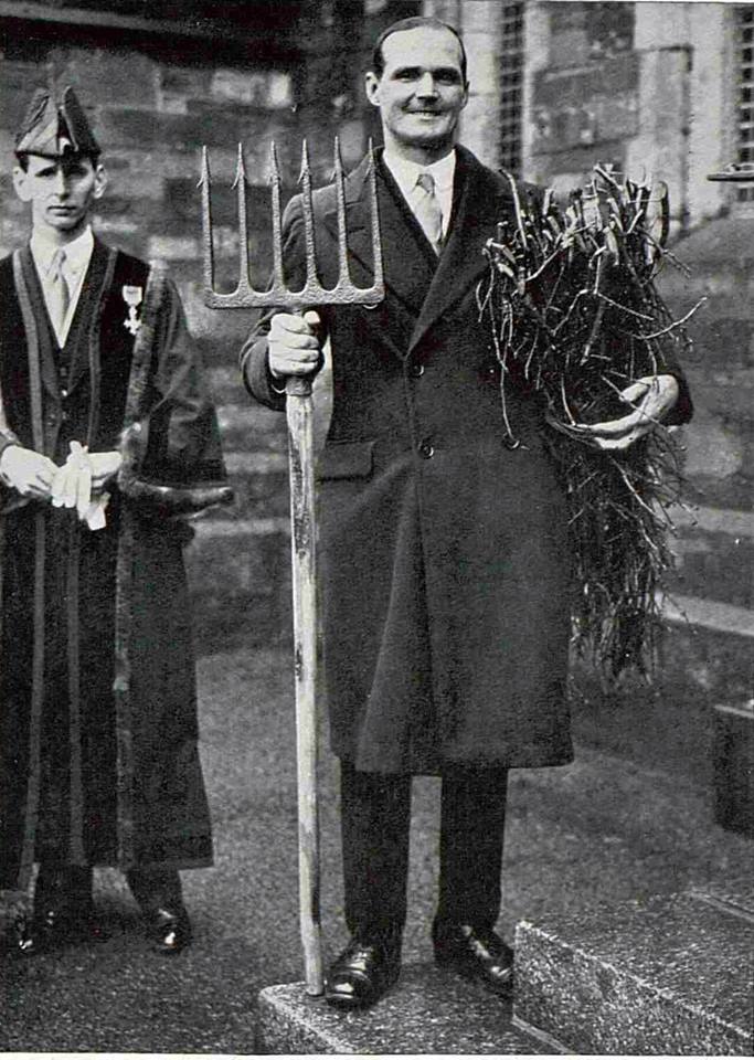 Mr. Stanley Langford with the Salmon spear and one carriage of wood to present to King George as representative of the manor of Stoke Climsland 1937.