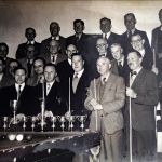 Members of Launceston British Legion snooker team with trophies, plus supporters, at Launceston & District Ex-Servicemen’s HQ, Edymead, Tavistock Road. Photograph taken around 1957. Front row: Cecil Gobey, (? Dennis), Roy Finnamore, Sydney Bridgman, George Steer, Ray Rashley, Ken Davy, (? Jones) Alfred Johns, Bert Tremain.
Second row: Gerald Geake, (unknown), Capt Ridler, Rodney Keast, Dr Galbraith, Frank (Francis) Mules, Ted Harry, Reg Golley
Back row: Harold Fry, Charlie Bradford, (unknown), Clarence Cavey, Fred Hamlyn, Les Fice. Photo courtesy of Beryl Parish. Launceston British Legion Members c.1957.