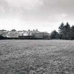Field adjacent to Tavistock Road on the west side looking towards St. Mary's Hospital in 1974. This is now the position of the A30 slip Road onto the A388. Photo courtesy of Steve Dymond.