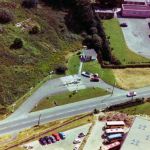 The A30 with Prouts Filling station and Launceston Hospital on one side and Launceston College on the opposite side.