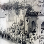 St. Cuthbert Mayne pilgrimage procession winds its way around by the Newport Market House during the 1930's.