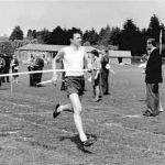 Launceston College Sports Day. Paddy Maguire winning by miles - watched by Herbie Beer, Brian Tunbridge, Wally Reeves. Photo courtesy of Chris Hicks.