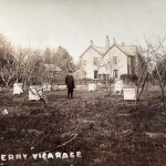 The Vicar attends to his beehives at Egloskerry Vicarage The Vicar attends to his beehives at Egloskerry Vicarage