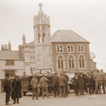 Group of men either getting on or off a couple of charabanc's in Launceston Town Square c.1922 Group of men either getting on or off a couple of charabanc's in Launceston Town Square c.1922