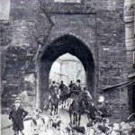 Lamerton Hunt riding through the Southgate in January 1938.