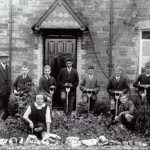 Children tending the garden outside the School House. c.1910's.