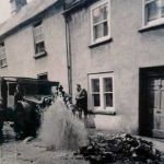 Mains Water pipe burst in 1952 outside No's 22 and 24 Westgate Street, Launceston. Photo courtesy of Vivien May.