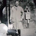 Bernards Robbins poses by The Southgate whilst on his milk rounds. Photo courtesy of Chris Robbins.