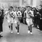 Bill Dinner, Eric Chapman, and Ron Logg in the Boys Brigade taking part in the baton relay to commemorate the festival of Britain. Picture taken at the Parade, Liskeard.