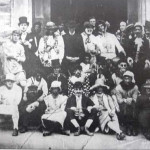 Fancy Dress football team pose outside the Drill Hall around 1912.
