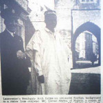 Nigerian visitor to Launceston in 1958. Here with the Stationmaster Mr A. G. Fenner.