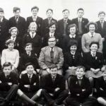 Pennygillam Secondary School. 'Bronco' Sheens class 1964-65. row left to right: Colin Russell, Dave Gliddon, Roger Bluett, Bob Tippett, Merv Jones, Roger Walters (earn), Christopher Chubb, Second Row: Dick Andrews (me), Judith Frayne, Sybol Larson, Pat Freer, Veronica Davey, Linda Masters, Keith Littlejohns. third row: Margaret Pengelly, Carol Jeffries, Irene Aze (Mrs Rodney Arnold), Bronco Sheen (he was our form teacher in the second year, Mrs Milerick was the one in the first year), Rita Stevens, Sylvia Maddiver, Heather Baker, fourth Row: John Ellacott, Graham Wickett (Felix), Tony Reddicliff, Paul Kuckembecker, Chistopher Arscott, Roger Buckley, Alan Keighly. Photo courtesy of Jill Aze-Thomas Pennygillam Secondary School. 'Bronco' Sheens class. row