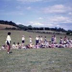 St Stephens school sports day, 1961. The event took place on what is now the fairway on the 16th hole at Launceston Golf Course. Shirley West in near foreground, to her right is me (in white shirt) with Keith Wonnacott (yellow shirt) talking to me. Then Elizabeth Dawe with red ribbon in her hair. Second from right is one of our teachers, the late Mabel Maddever. Photo courtesy of Chris Gynn