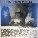 Mrs. Phyllis Morey presents a cheque to the Leukemia Research Fund in 1985.