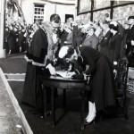 The Queen signs the Launceston Guestbook. The Queen signs the Launceston Guestbook.