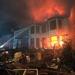Firefighters tackle the blazing house on Victoria Road. November 20th, 2013. Firefighters tackle the blazing house on Victoria Road. November 20th, 2013.