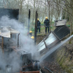 Shed Fire at Lewdown, March 23rd, 2003. Photo courtesy of Gary Chapman. Shed Fire at Lewdown, March 23rd, 2003. Photo courtesy of Gary Chapman.